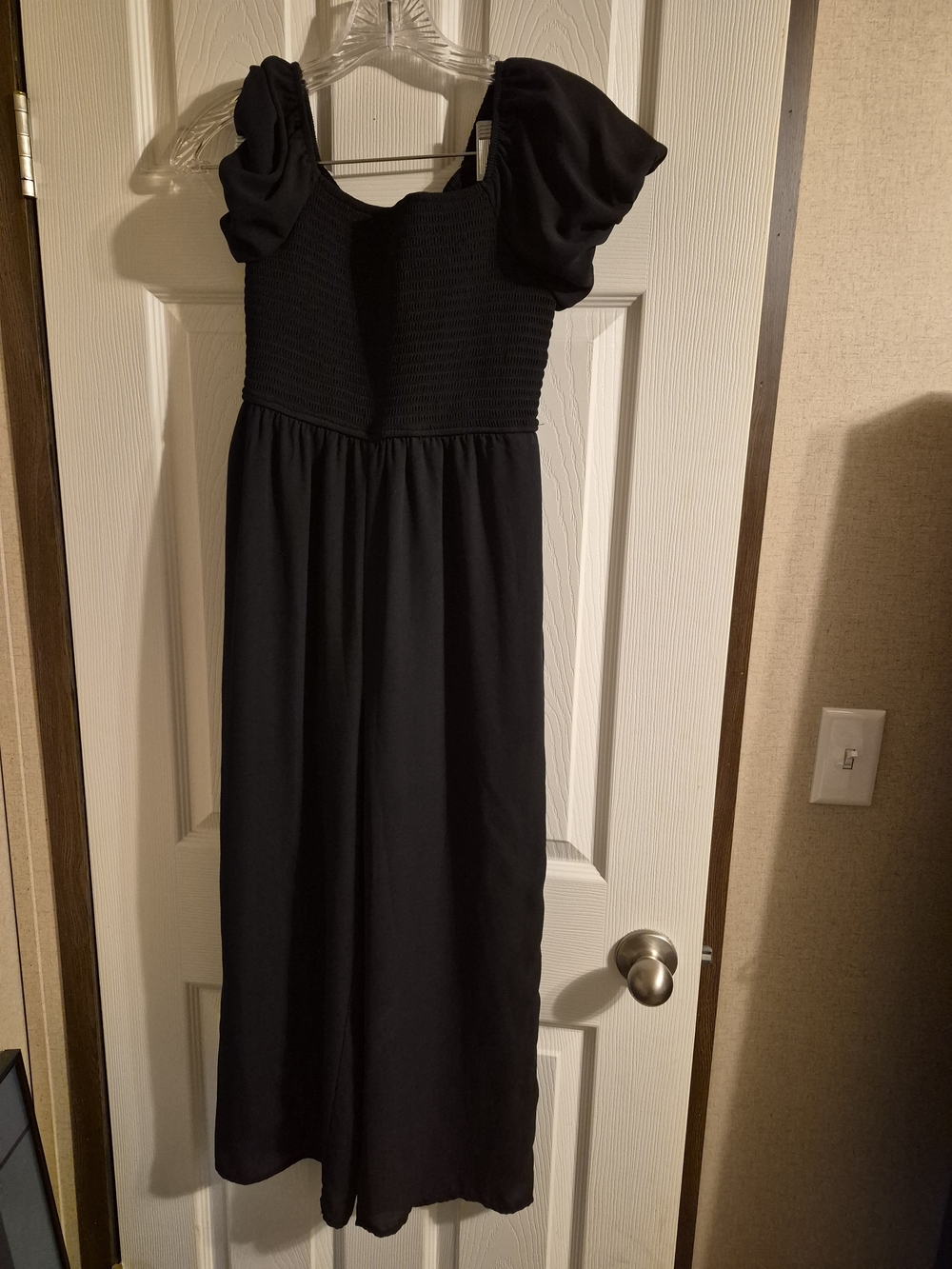 Frankie B. Black Smocked Jumpsuit with Puff Sleeves